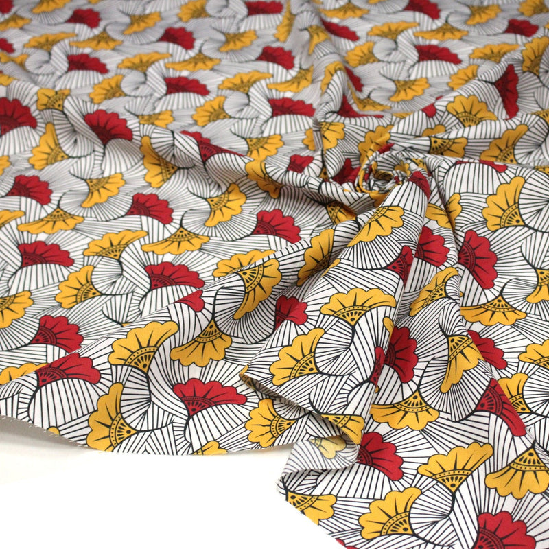 Tissu cotonnade motif WAX floral, fleurs rouges et jaunes - OEKO - TEX STANDARD 100 - TissusPapi.com