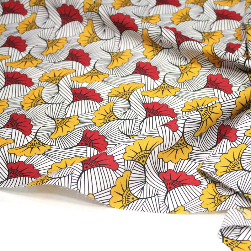 Tissu cotonnade motif WAX floral, fleurs rouges et jaunes - OEKO - TEX STANDARD 100 - TissusPapi.com