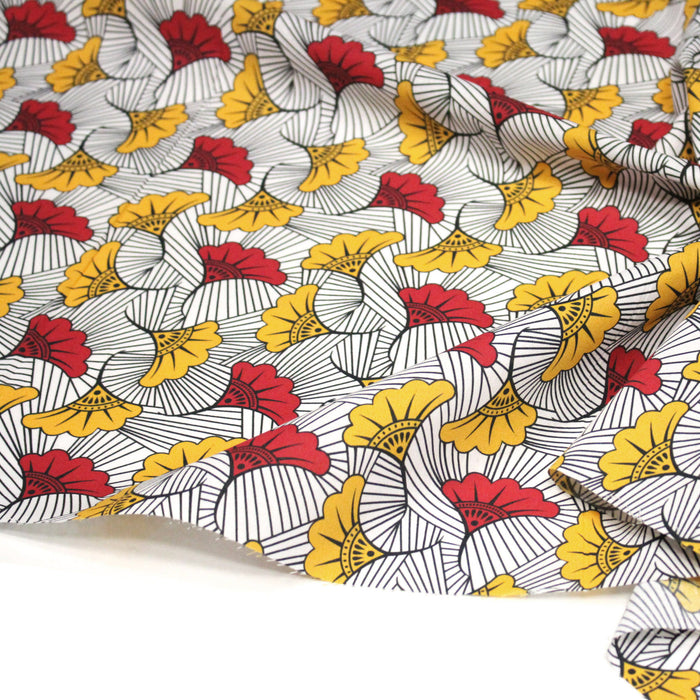 Tissu cotonnade motif WAX floral, fleurs rouges et jaunes - OEKO-TEX STANDARD 100
