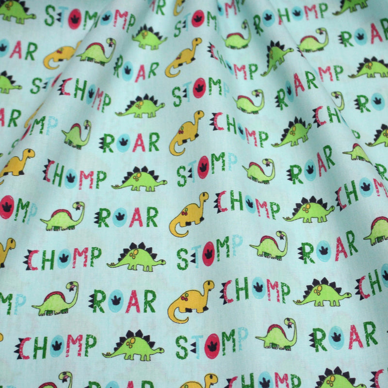 Tissu popeline coton DINO ROAR, bleu aux motifs dinosaures multicolores - TissusPapi.com
