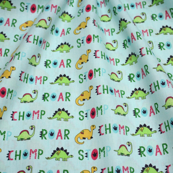 Tissu popeline coton DINO ROAR, bleu aux motifs dinosaures multicolores - TissusPapi.com