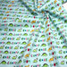 Tissu popeline coton DINO ROAR, bleu aux motifs dinosaures multicolores - TissusPapi.com
