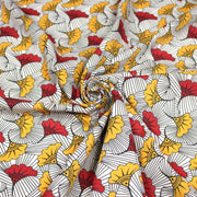 Tissu cotonnade motif WAX floral, fleurs rouges et jaunes - OEKO - TEX STANDARD 100 - TissusPapi.com