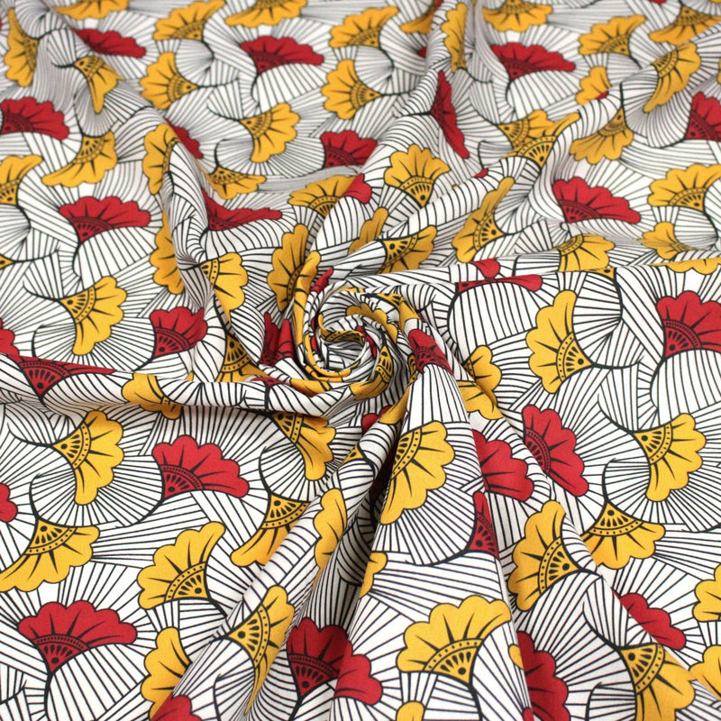 Tissu cotonnade motif WAX floral, fleurs rouges et jaunes - OEKO - TEX STANDARD 100 - TissusPapi.com
