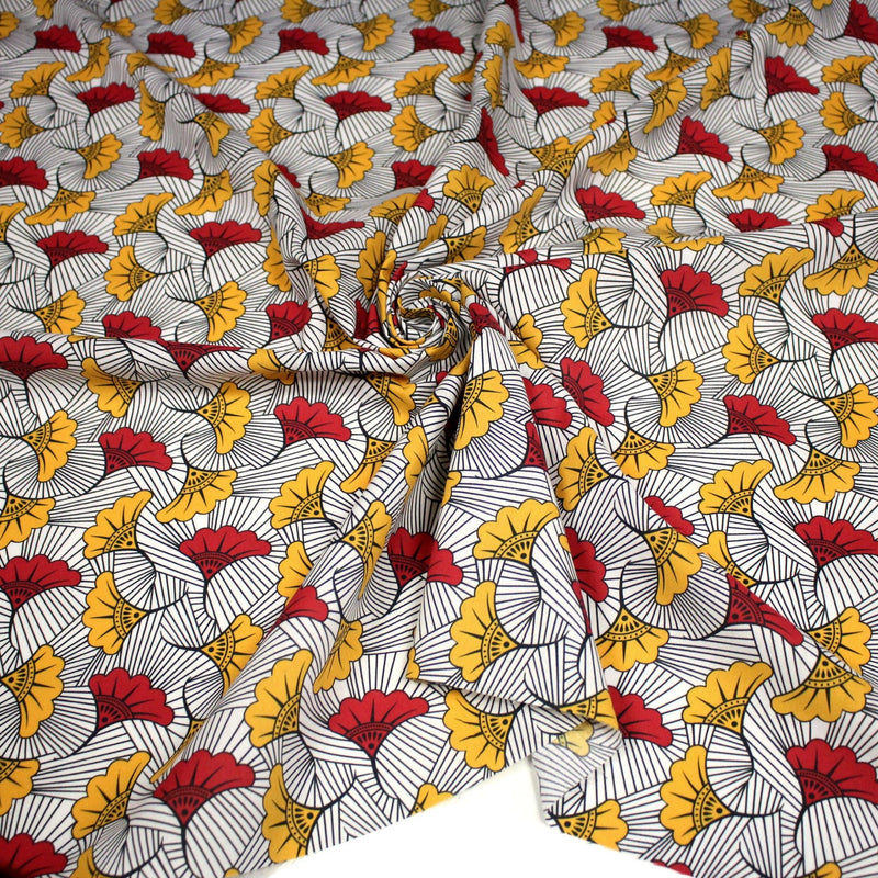 Tissu cotonnade motif WAX floral, fleurs rouges et jaunes - OEKO - TEX STANDARD 100 - TissusPapi.com