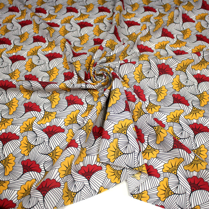 Tissu cotonnade motif WAX floral, fleurs rouges et jaunes - OEKO-TEX STANDARD 100