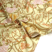 Tissu cotonnade VICTOR au feuillage ART NOUVEAU multicolore, fond vert anis - OEKO - TEX STANDARD 100 - TissusPapi.com