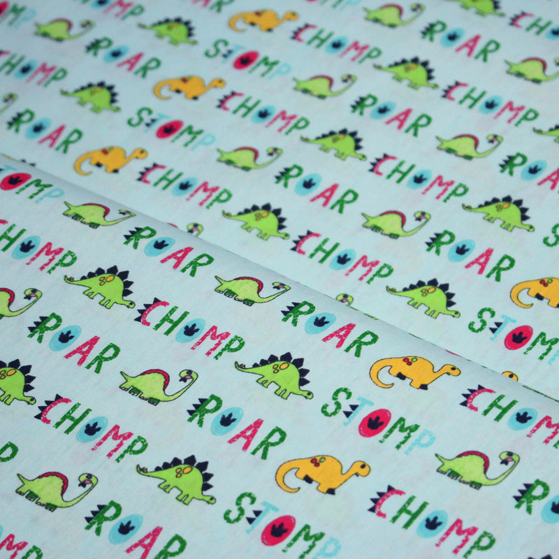 Tissu popeline coton DINO ROAR, bleu aux motifs dinosaures multicolores - TissusPapi.com