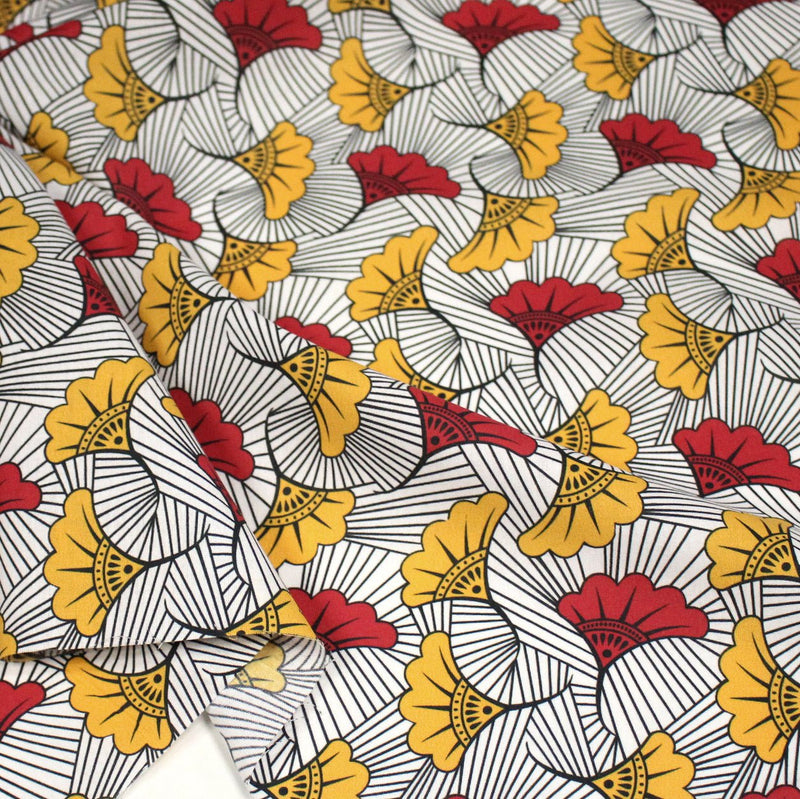 Tissu cotonnade motif WAX floral, fleurs rouges et jaunes - OEKO - TEX STANDARD 100 - TissusPapi.com