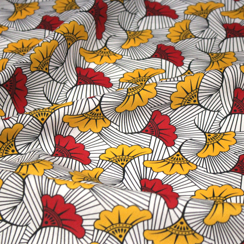 Tissu cotonnade motif WAX floral, fleurs rouges et jaunes - OEKO - TEX STANDARD 100 - TissusPapi.com