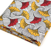 Tissu cotonnade motif WAX floral, fleurs rouges et jaunes - OEKO - TEX STANDARD 100 - TissusPapi.com