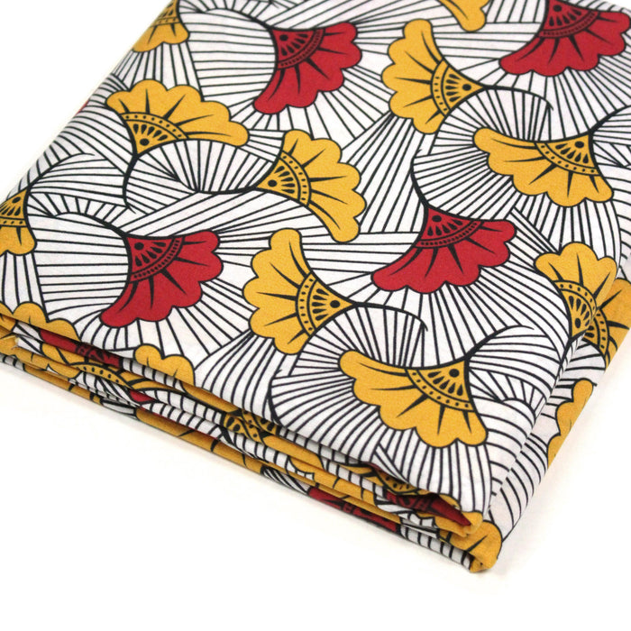 Tissu cotonnade motif WAX floral, fleurs rouges et jaunes - OEKO-TEX STANDARD 100