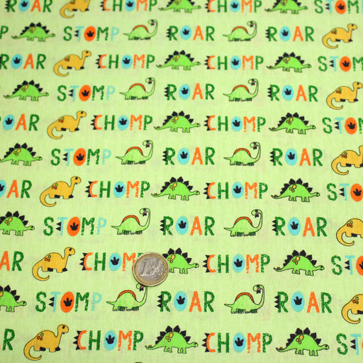 Tissu popeline coton DINO ROAR, vert aux motifs dinosaures multicolores - TissusPapi.com