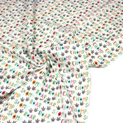 Tissu popeline coton DINO ROAR, blanc aux motifs dinosaures multicolores - TissusPapi.com