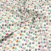 Tissu popeline coton DINO ROAR, blanc aux motifs dinosaures multicolores - TissusPapi.com