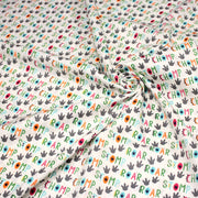 Tissu popeline coton DINO ROAR, blanc aux motifs dinosaures multicolores - TissusPapi.com