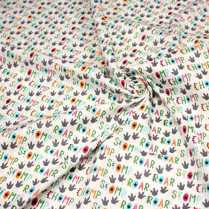 Tissu popeline coton DINO ROAR, blanc aux motifs dinosaures multicolores - TissusPapi.com