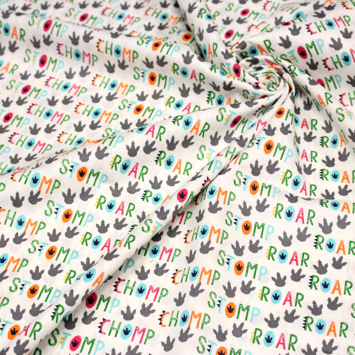 Tissu popeline coton DINO ROAR, blanc aux motifs dinosaures multicolores - TissusPapi.com