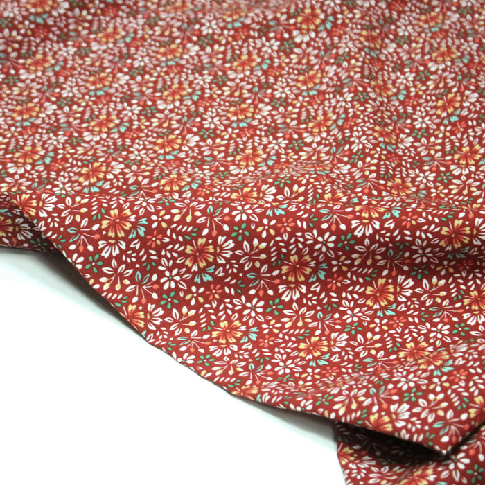 Tissu popeline de viscose rouge aux fines fleurs blanches et jaunes - Fabrication française - OEKO-TEX