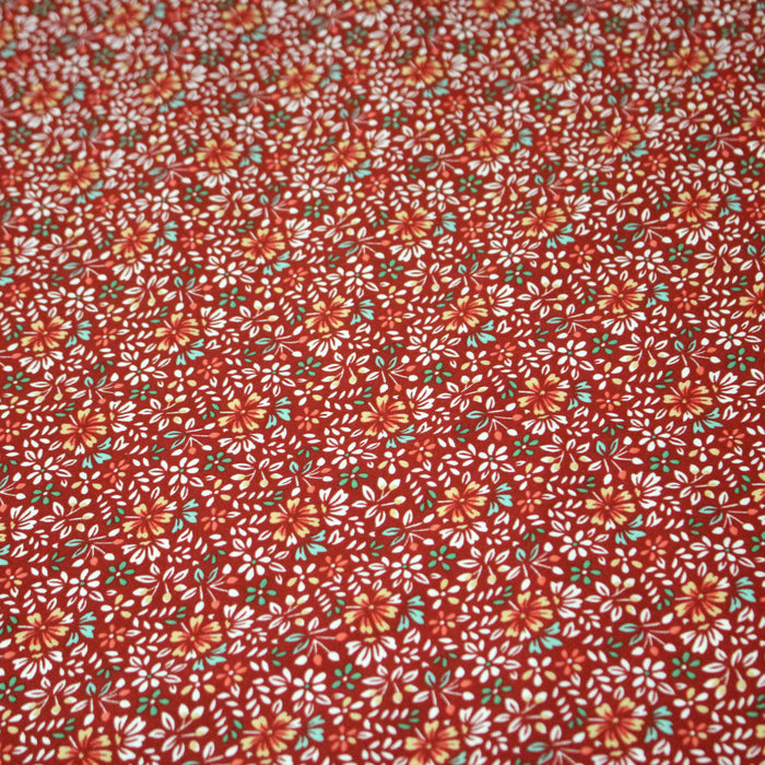 Tissu popeline de viscose rouge aux fines fleurs blanches et jaunes - Fabrication française - OEKO-TEX