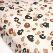 Tissu matelassé LEOPARD, écru et taches léopard noires, roses, ocres - OEKO - TEX - TissusPapi.com