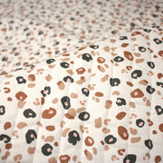 Tissu matelassé LEOPARD, écru et taches léopard noires, roses, ocres - OEKO - TEX - TissusPapi.com