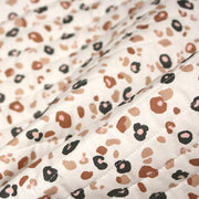 Tissu matelassé LEOPARD, écru et taches léopard noires, roses, ocres - OEKO - TEX - TissusPapi.com