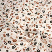 Tissu matelassé LEOPARD, écru et taches léopard noires, roses, ocres - OEKO - TEX - TissusPapi.com