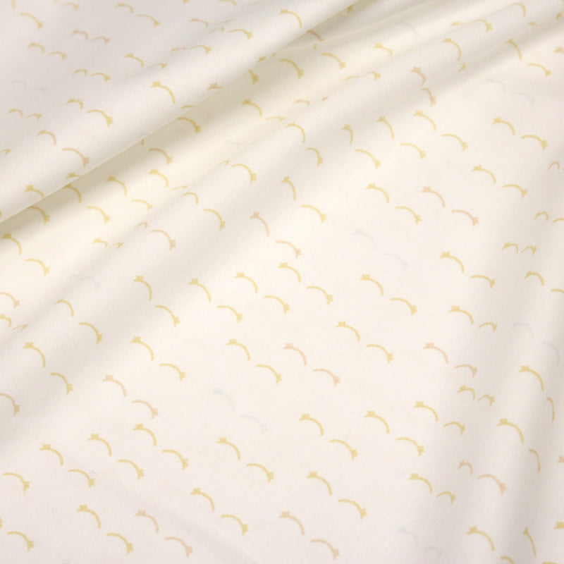 Tissu popeline coton les étoiles filantes jaunes, fond blanc - TissusPapi.com