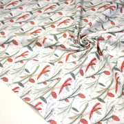 Tissu coton NOËL blanc aux branches sapins et pommes de pin rouges - OEKO - TEX - TissusPapi.com