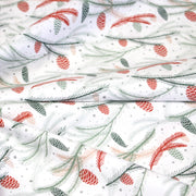 Tissu coton NOËL blanc aux branches sapins et pommes de pin rouges - OEKO - TEX - TissusPapi.com