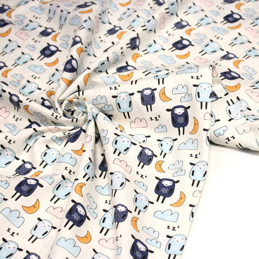 Tissu popeline coton Les montons font dodo, tons écrus bleus oranges - TissusPapi.com