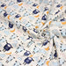 Tissu popeline coton Les montons font dodo, tons écrus bleus oranges - TissusPapi.com