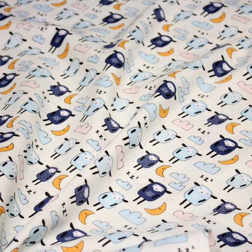 Tissu popeline coton Les montons font dodo, tons écrus bleus oranges - TissusPapi.com