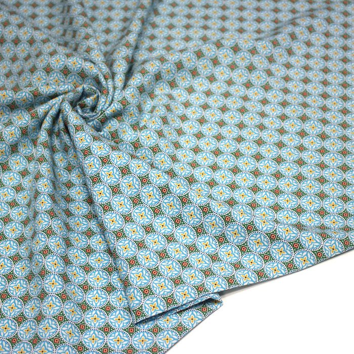 Tissu popeline de viscose aux motifs géométriques bleu turquoise moucharabieh - Fabrication française - OEKO-TEX