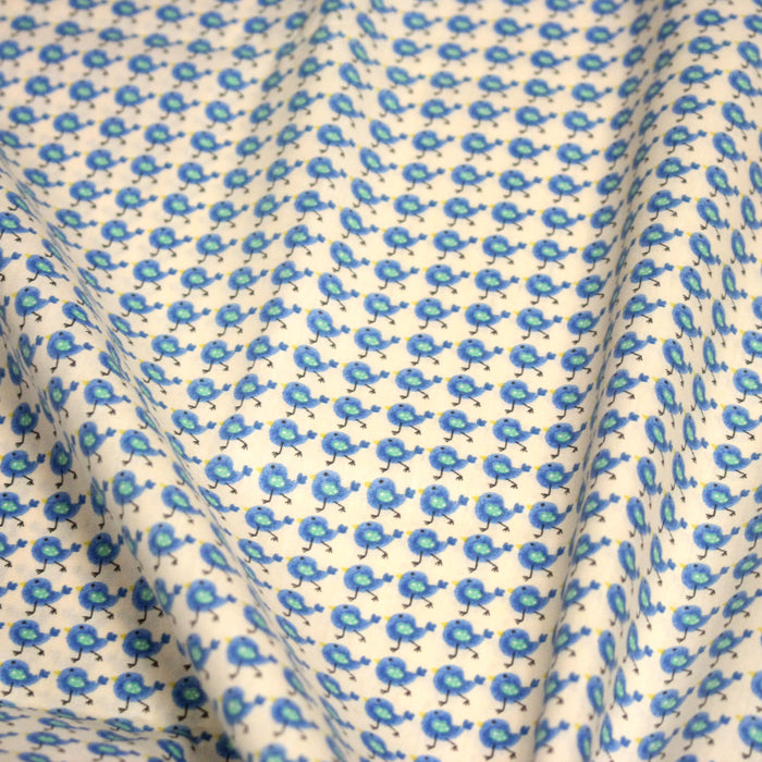 Tissu popeline coton Le petit oiseau bleu, fond écru - TissusPapi.com