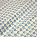 Tissu popeline coton Le petit oiseau bleu, fond écru - TissusPapi.com