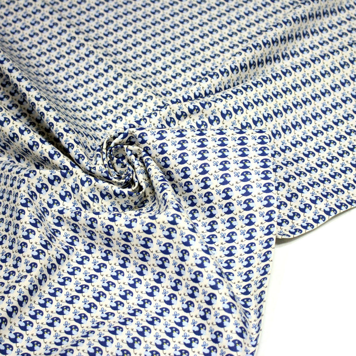 Tissu popeline coton L'oiseau bleu roi, fond écru - TissusPapi.com