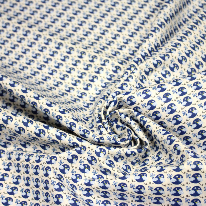 Tissu popeline coton L'oiseau bleu roi, fond écru - TissusPapi.com