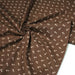 Tissu popeline coton marron aux triangles crème - TissusPapi.com