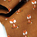 Tissu popeline coton rouille aux jolis renards - TissusPapi.com