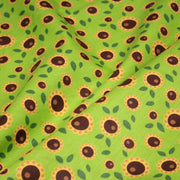 Tissu popeline coton vert aux tournesols jaunes & feuilles vertes - TissusPapi.com