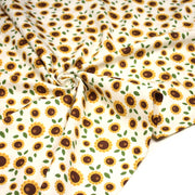 Tissu popeline coton blanc aux tournesols jaunes & feuilles vertes - TissusPapi.com