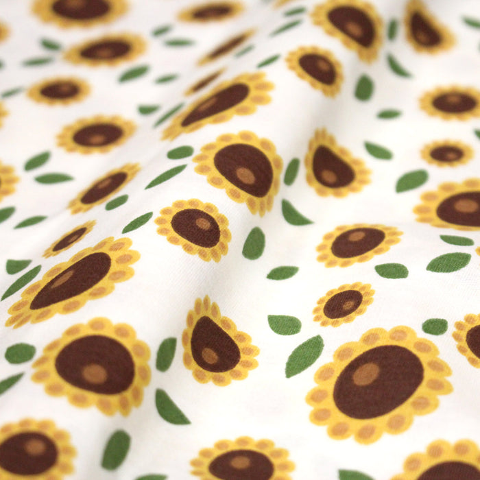 Tissu popeline coton blanc aux tournesols jaunes & feuilles vertes - TissusPapi.com
