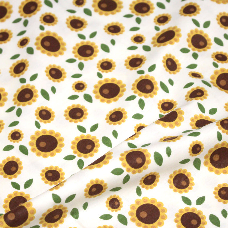 Tissu popeline coton blanc aux tournesols jaunes & feuilles vertes - TissusPapi.com