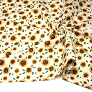 Tissu popeline coton blanc aux tournesols jaunes & feuilles vertes - TissusPapi.com