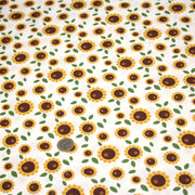 Tissu popeline coton blanc aux tournesols jaunes & feuilles vertes - TissusPapi.com