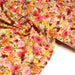 Tissu double gaze imprimée fleuri rose et jaune - OEKO - TEX STANDARD 100 - TissusPapi.com