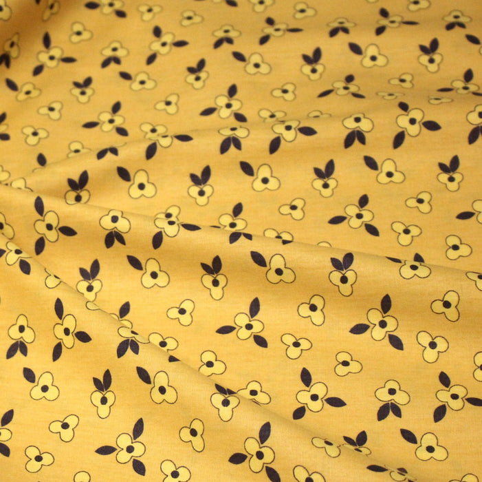 Tissu popeline coton jaune aux fleurs graphiques jaunes - TissusPapi.com