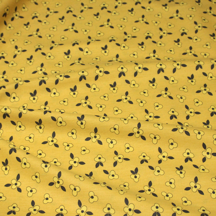 Tissu popeline coton jaune aux fleurs graphiques jaunes - TissusPapi.com